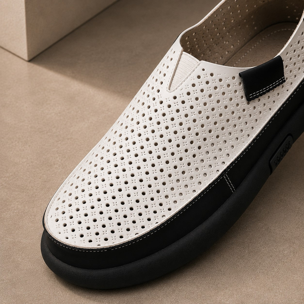 PERFORATED COWHIDE LOAFERS