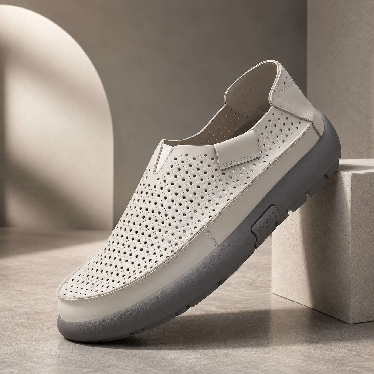 PERFORATED COWHIDE LOAFERS